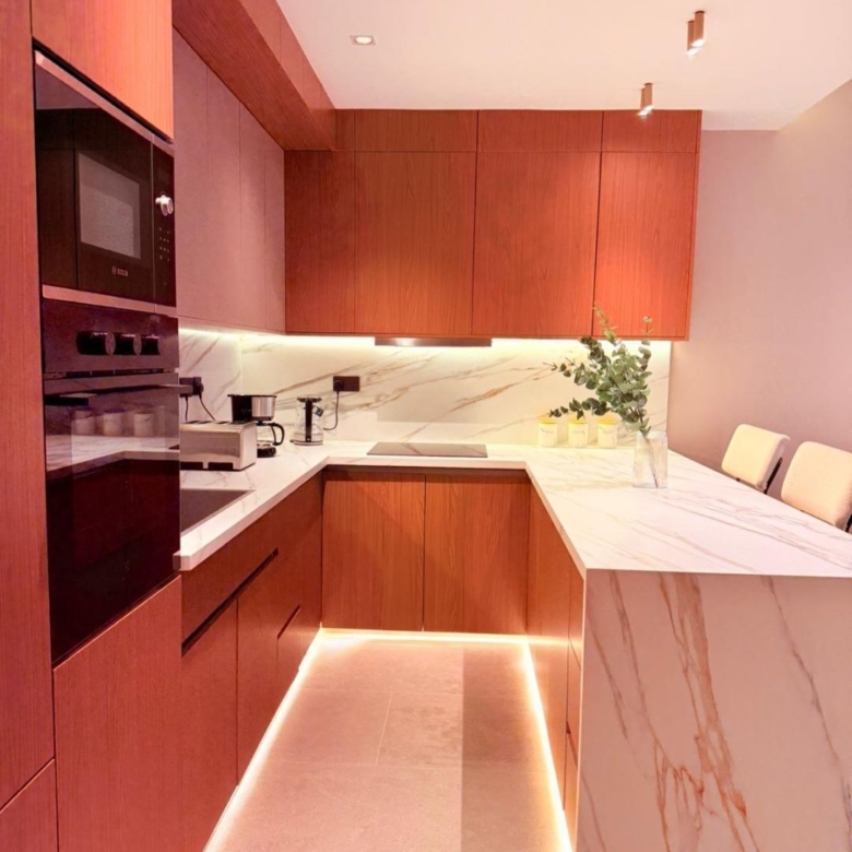 Fully equipped kitchen with breakfast peninsula at Silva Gigiri