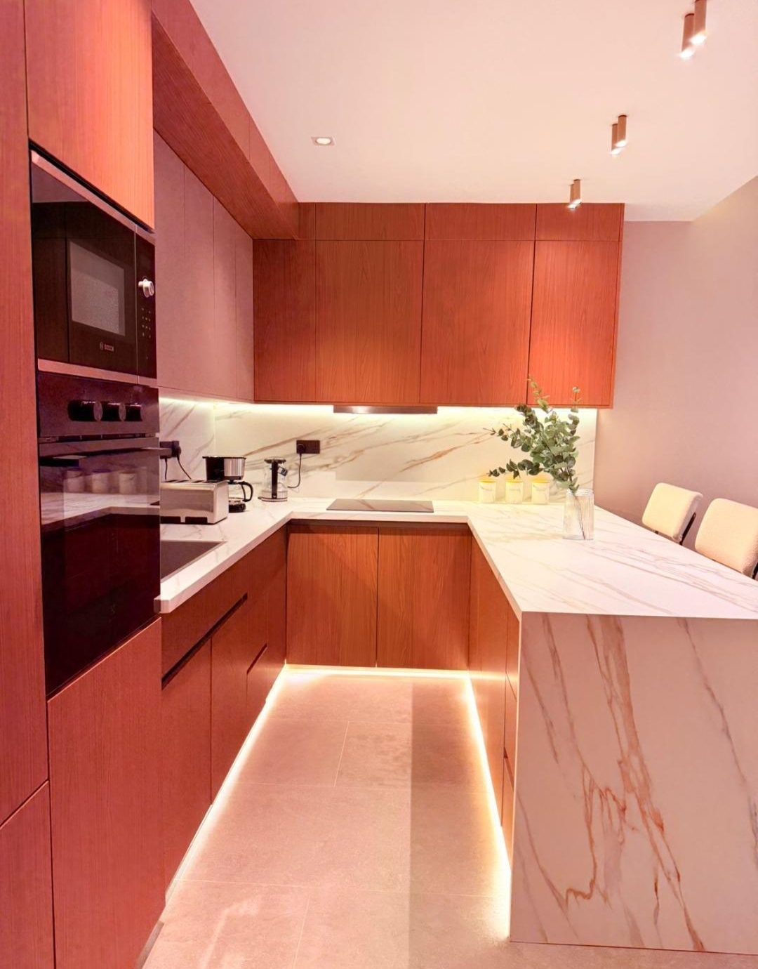 Fully equipped kitchen with breakfast peninsula at Silva Gigiri