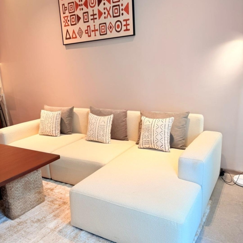 Furnished living room with sectional sofa at Silva Gigiri apartments