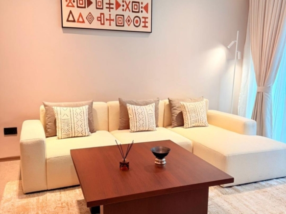 Bright furnished living room with sectional sofa at Silva Gigiri