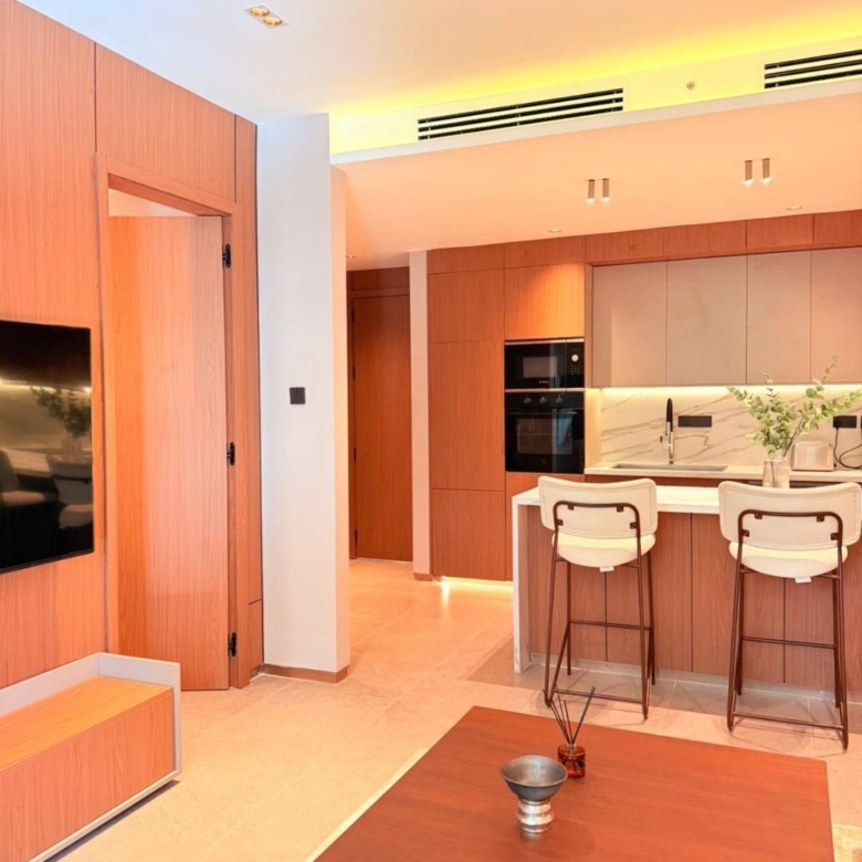 Furnished living area with kitchen and television at Silva Gigiri