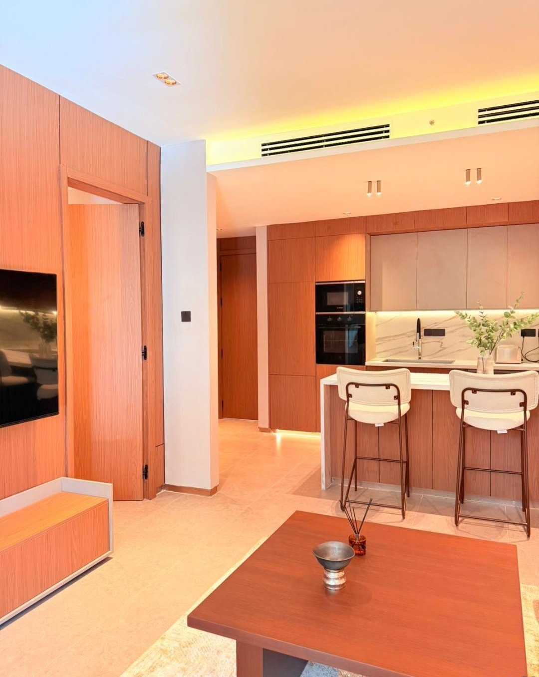 Furnished living area with kitchen and television at Silva Gigiri