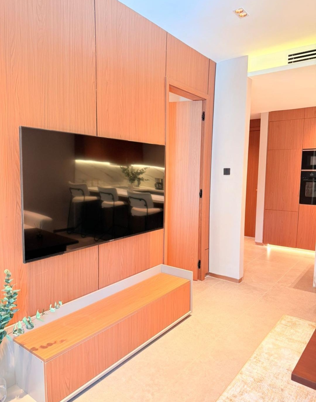 Wood-panelled television wall inside a Silva Gigiri apartment