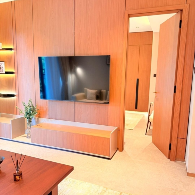 Living room entertainment wall and bedroom entrance at Silva Gigiri