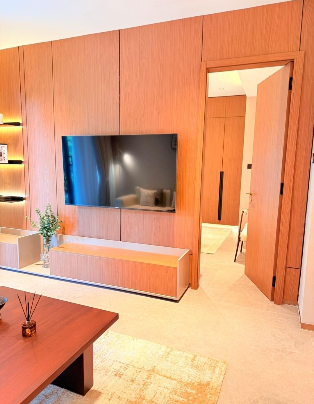 Living room entertainment wall and bedroom entrance at Silva Gigiri