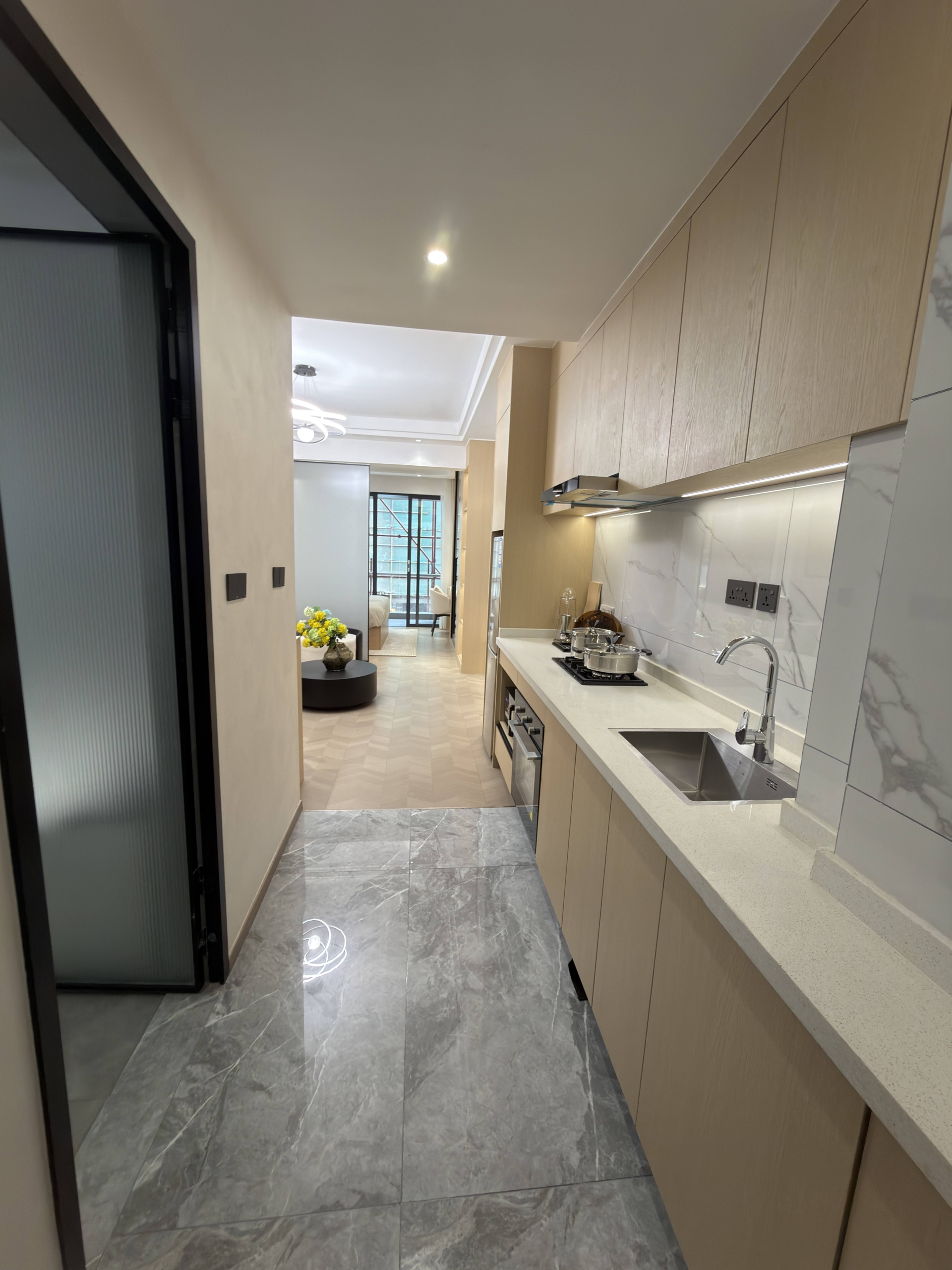 Fitted galley kitchen in a 1 bedroom apartment for sale in Westlands