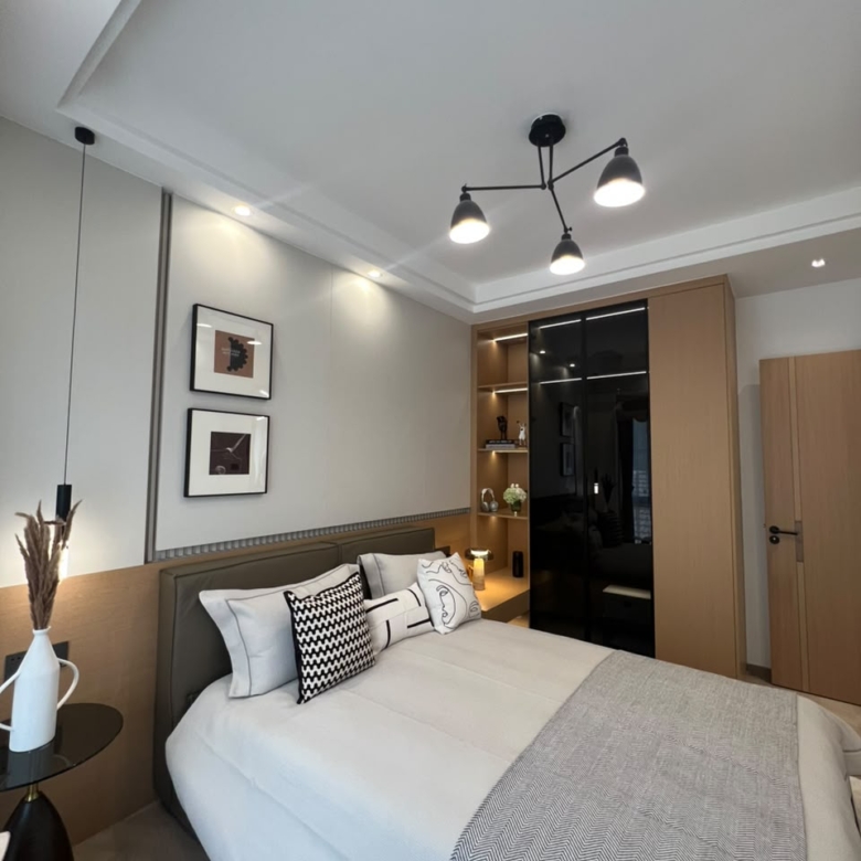 Furnished bedroom with large windows in a 2 bedroom apartment for sale in Westlands
