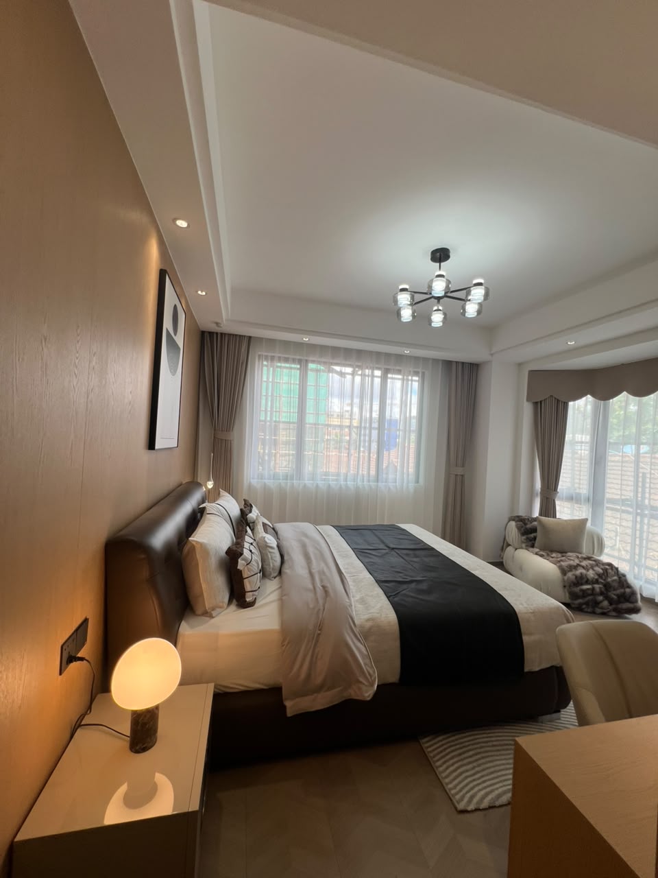 Furnished bedroom with soft lighting in a Westlands 2 bedroom apartment