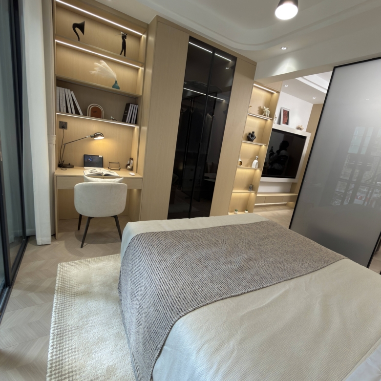 Bedroom with fitted study area and wardrobe in a Westlands apartment