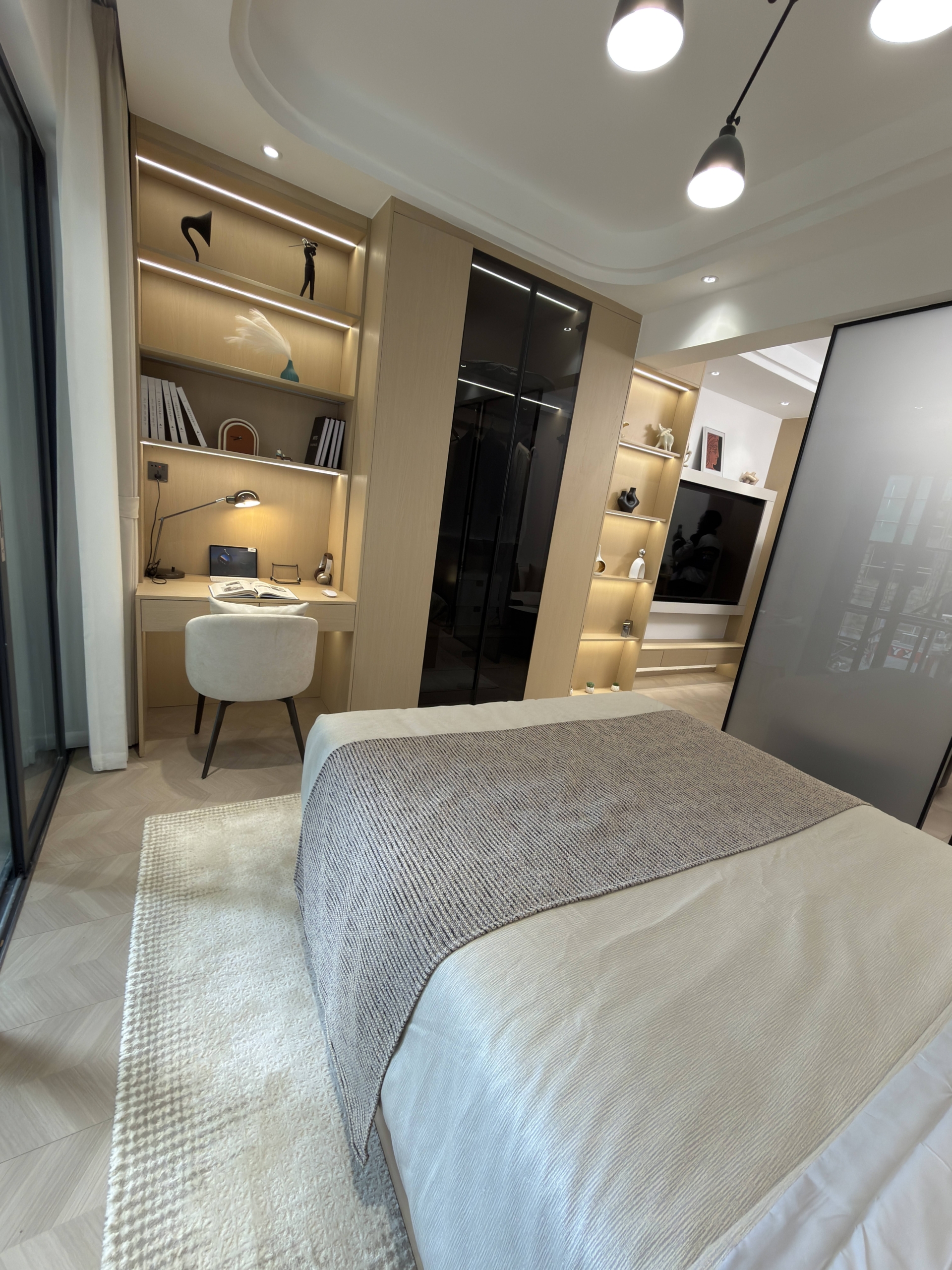 Bedroom with fitted study area and wardrobe in a Westlands apartment