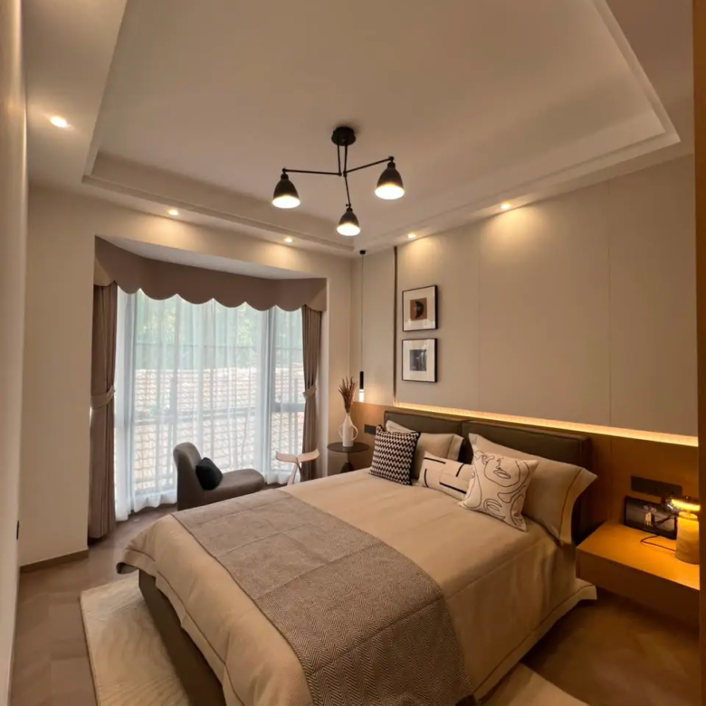 Furnished master bedroom with large window in a Westlands apartment