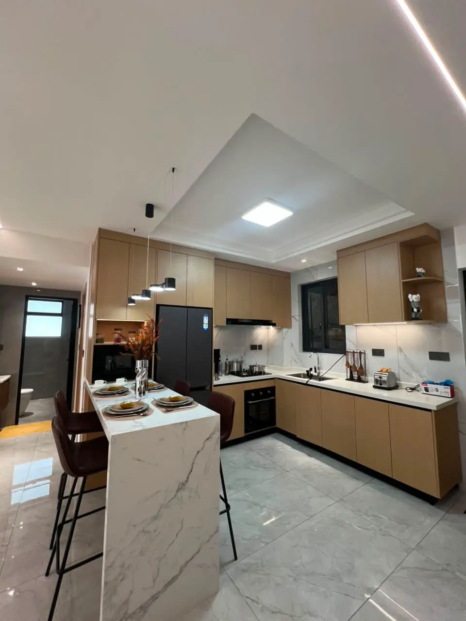 Modern Westlands Apartment Kitchen Island Modern fitted kitchen with breakfast island in a 2 bedroom Westlands apartment