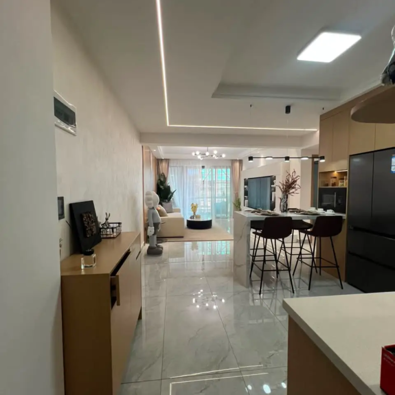 Open-plan living room and kitchen in a modern 2 bedroom Westlands apartment
