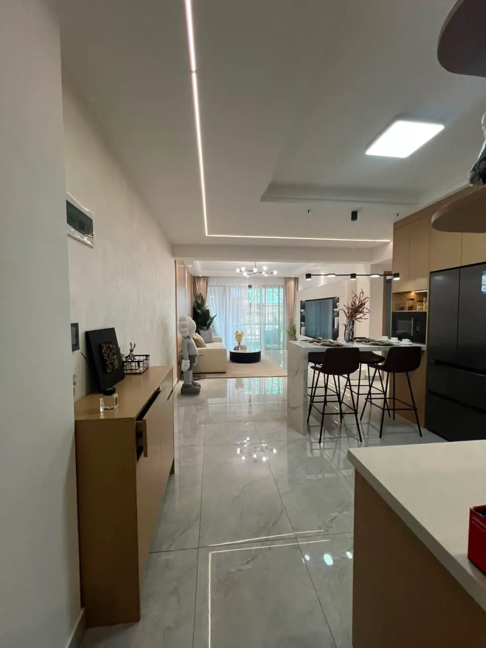 Open-plan living room and kitchen in a modern 2 bedroom Westlands apartment