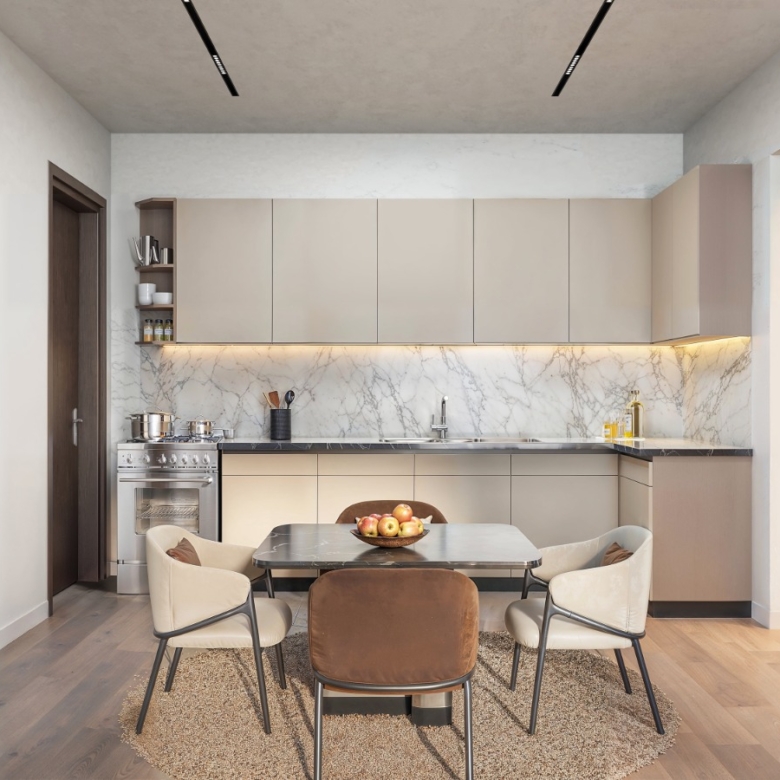 Baystar residence modern kitchen and dining area with fitted cabinets, marble-effect backsplash and contemporary dining furniture.