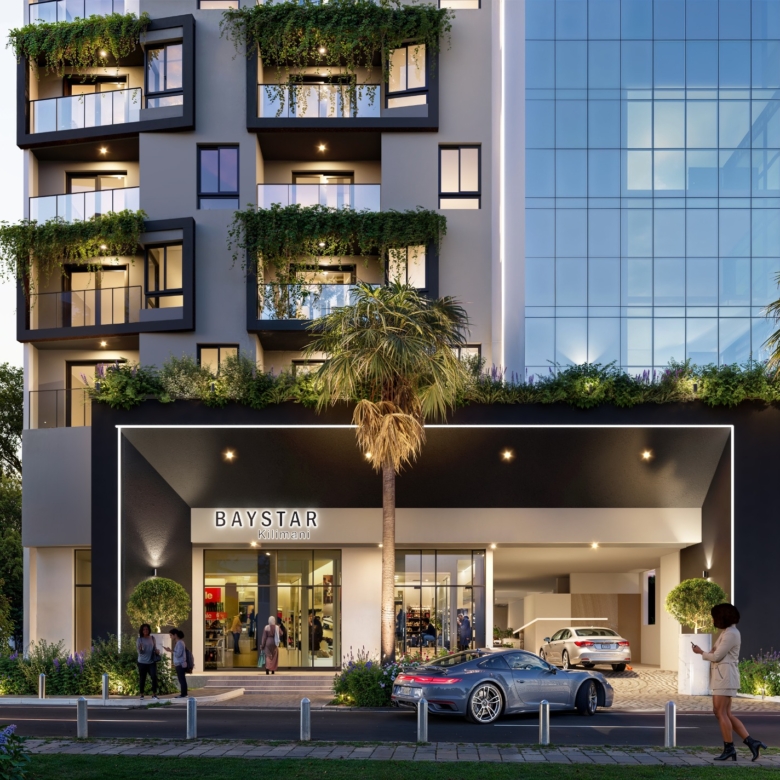 Baystar residence main entrance in Kilimani showing modern architectural design, landscaped frontage, glass balconies and driveway.