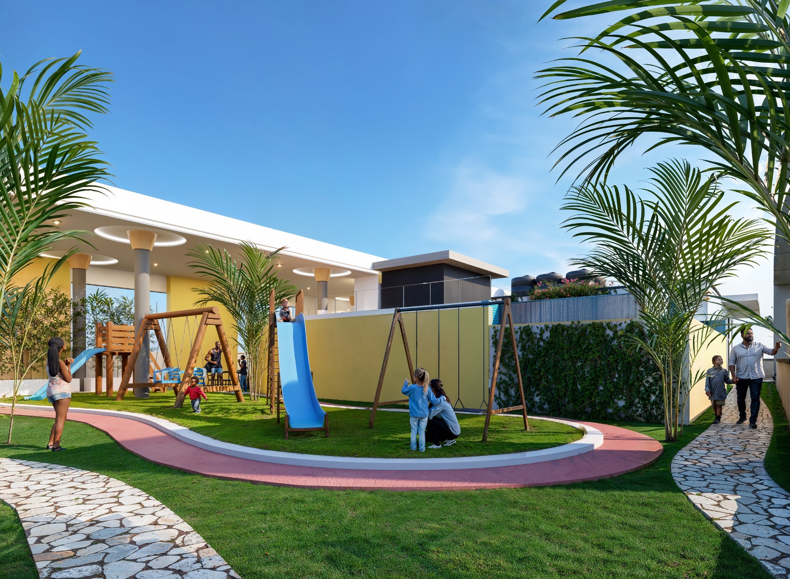 Baystar residence children's outdoor play area with swings, slides, green lawns, palm trees and landscaped pathways.