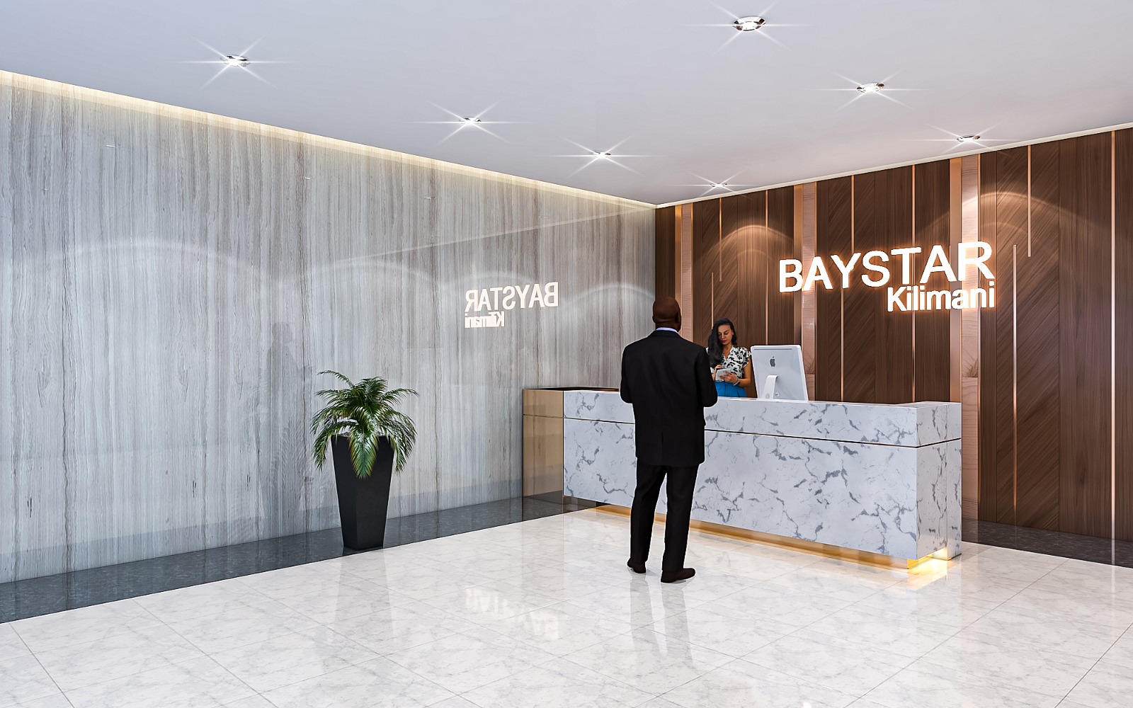 Baystar residence reception lobby in Kilimani featuring marble reception desk, modern lighting, wooden wall panels and elegant finishes.