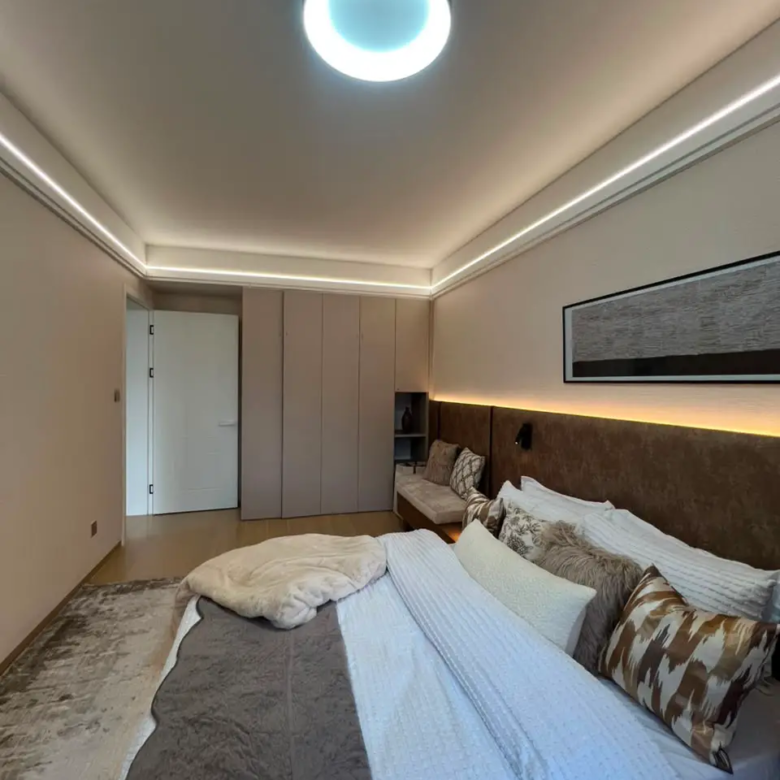 Marble West apartment bedroom with fitted wardrobes
