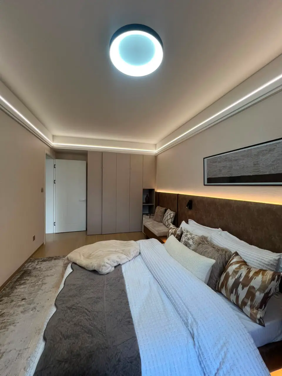 Marble West apartment bedroom with fitted wardrobes