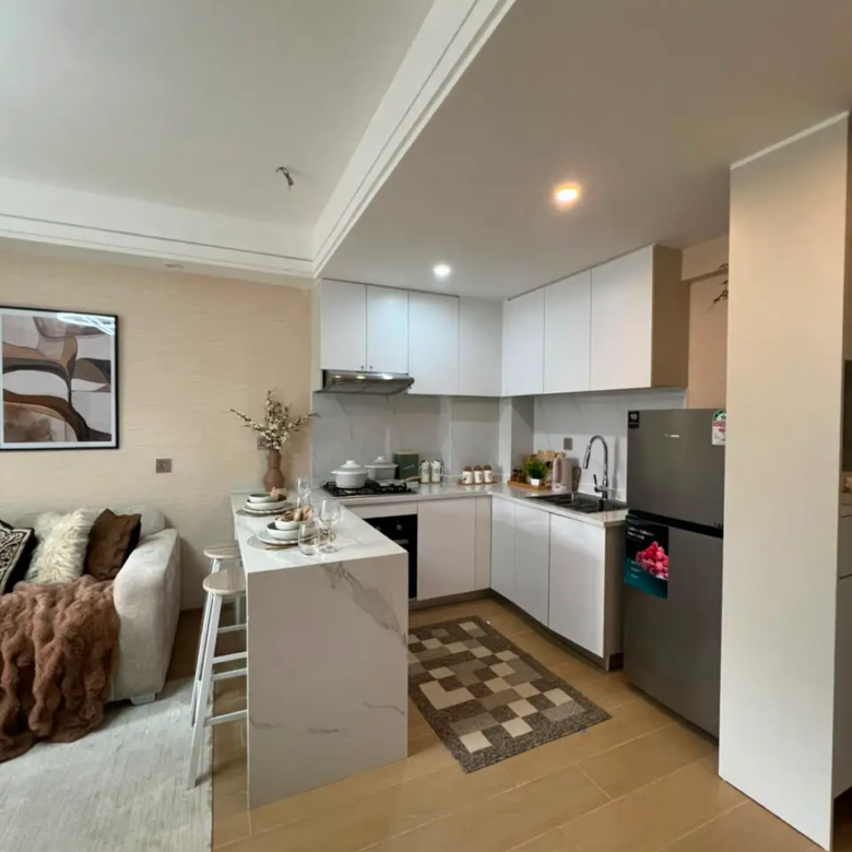 Modern open-plan kitchen at Marble West Apartments Westlands