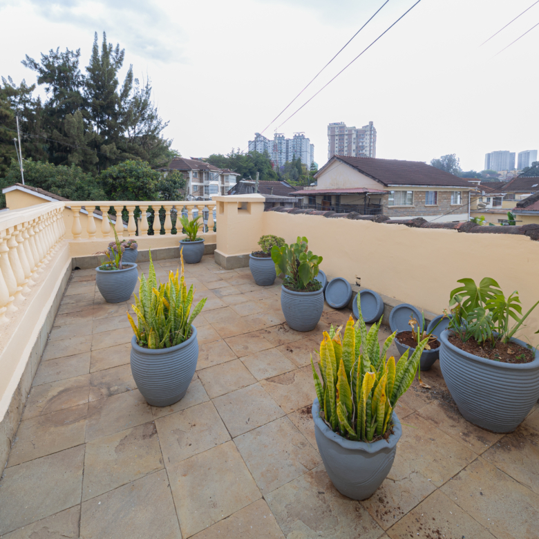 Private terrace with plants at Oloitoktok Court townhouse Kileleshwa