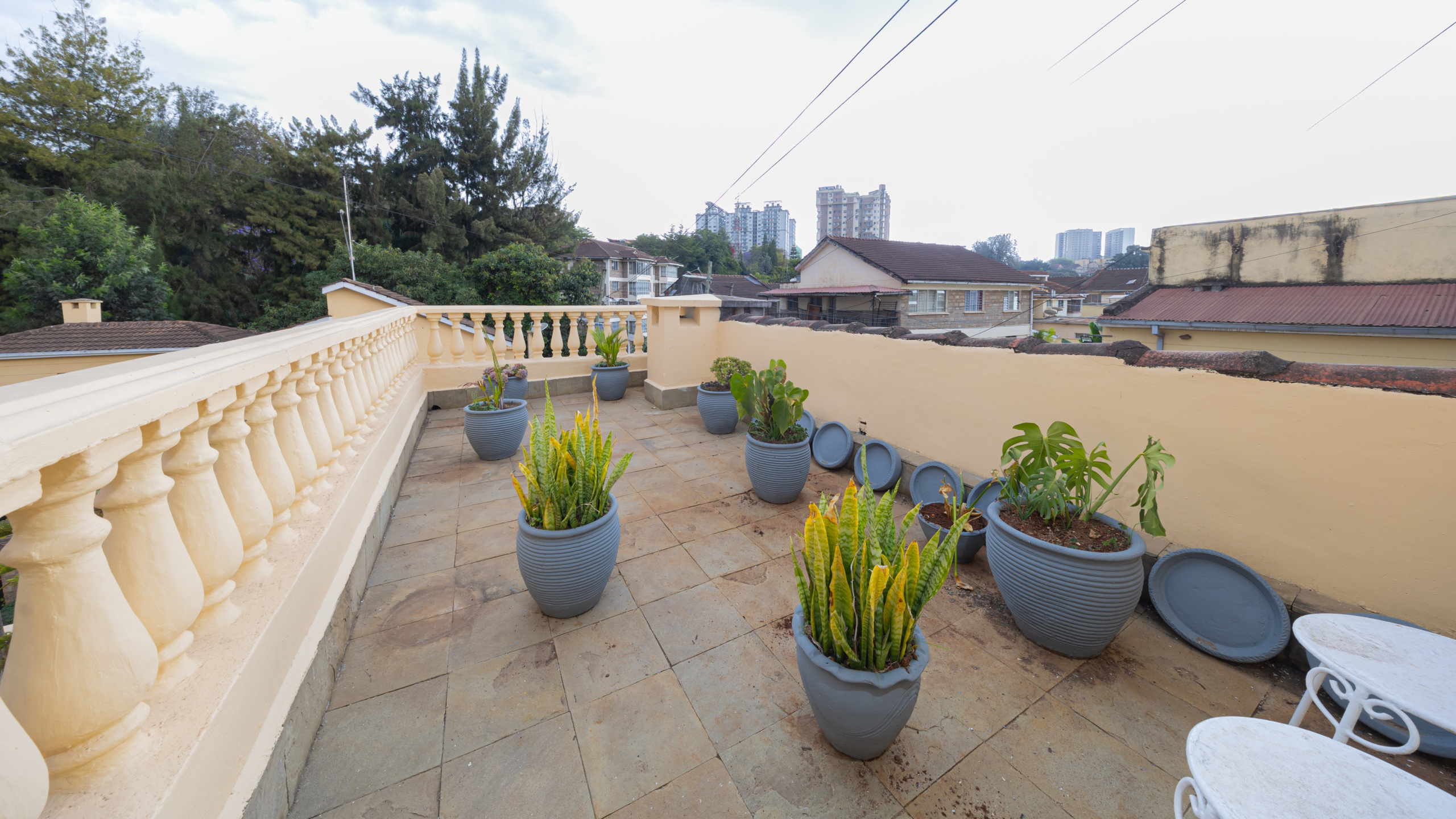 Private terrace with plants at Oloitoktok Court townhouse Kileleshwa