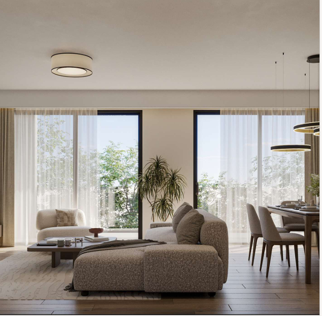 AERA Westlands open-plan living and dining room featuring a contemporary sectional sofa, elegant dining furniture, large windows, natural lighting, and sophisticated modern finishes.