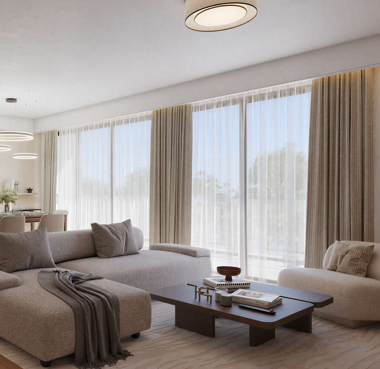 AERA Westlands luxury living room featuring a spacious beige sectional sofa, modern coffee table, floor-to-ceiling windows, elegant curtains, and minimalist contemporary interior design.