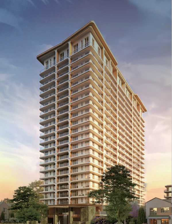 Avana Oasis Apartments illuminated residential tower at night with modern glass balconies and luxury entrance lighting.