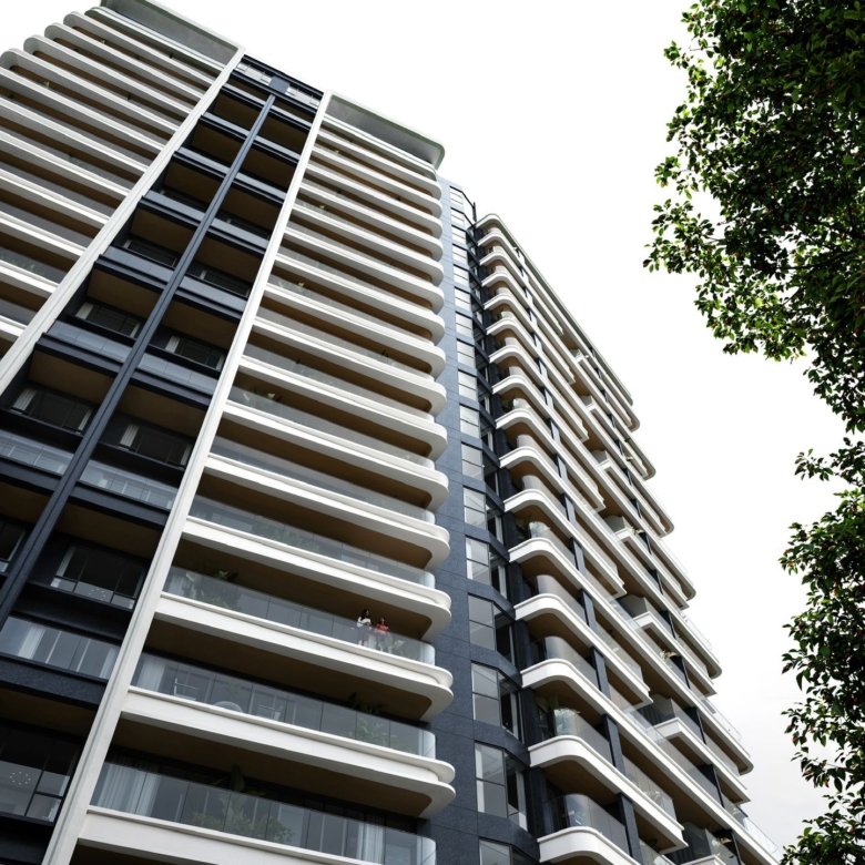 Balkis Residence Riverside Nairobi modern apartment exterior with spacious balconies and glass railings.