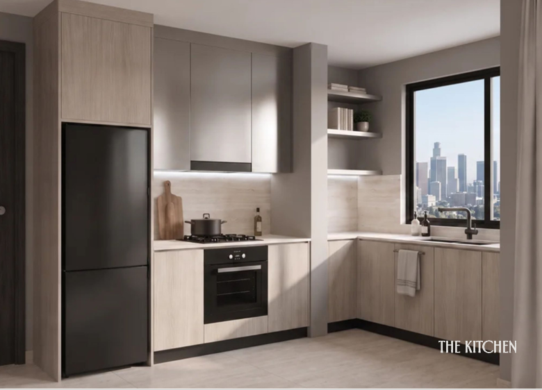 Belmont Residence modern apartment kitchen featuring L-shaped countertops, fitted cabinets, integrated oven, gas hob, refrigerator, and large window overlooking the city.