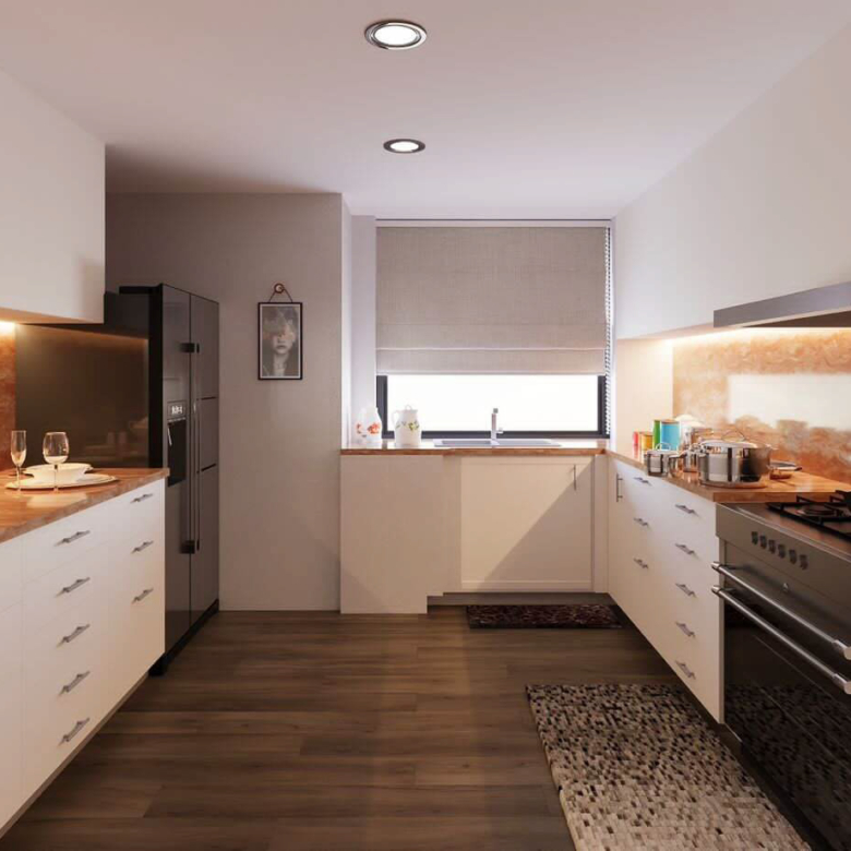 Hayat Heights apartments Kilimani modern fitted kitchen with white cabinets, marble-effect countertops, oven and elegant lighting.