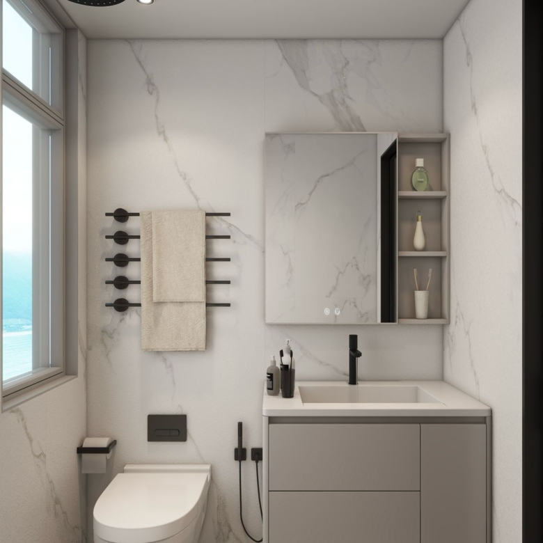 Lilydale Riverside contemporary washroom with modern toilet, illuminated vanity mirror, floating cabinet and marble-effect wall finishes.