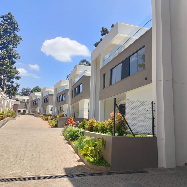 Radiant Villas gated community in Westlands Peponi Road featuring modern luxury villas, landscaped gardens and paved driveway.