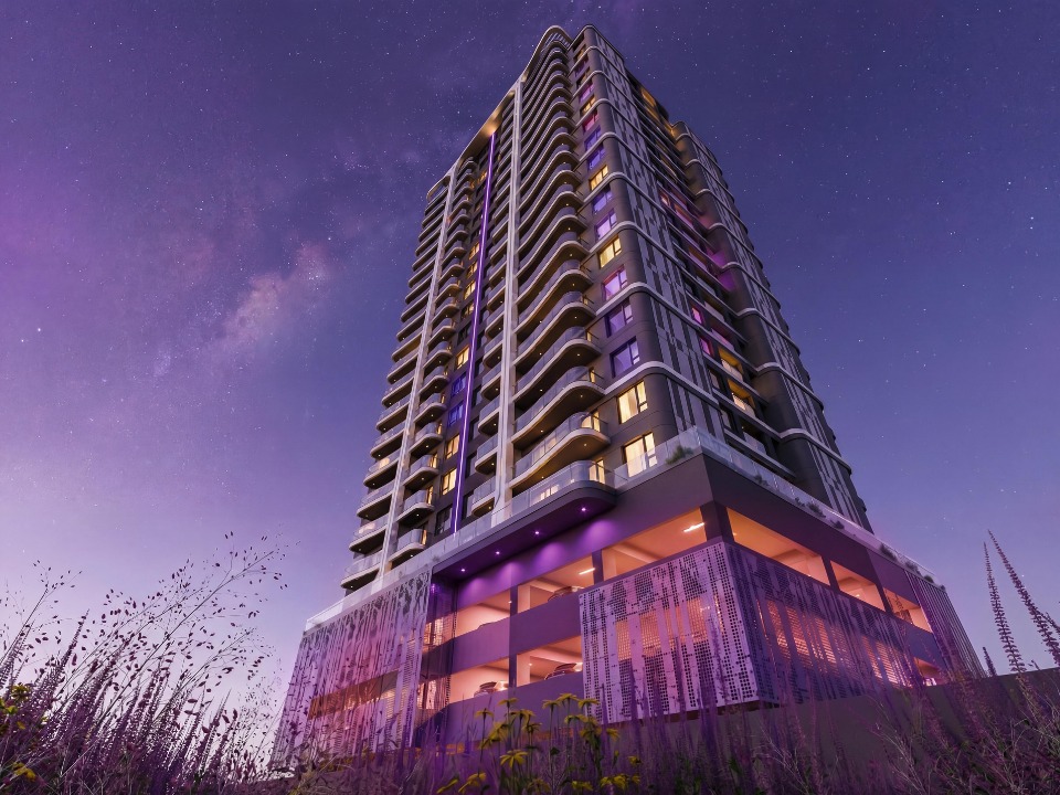 Sonder-space-exterior Sonder Space Residence luxury apartment tower at night in Kileleshwa Nairobi featuring illuminated balconies and modern exterior design.