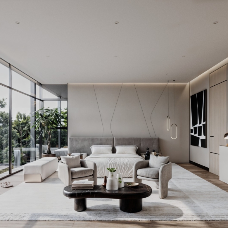 Leroux Villas spacious bedroom with a modern lounge area and garden views