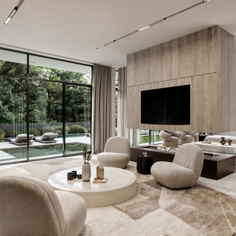 Leroux Villas luxury lounge with contemporary seating and garden-facing glass doors